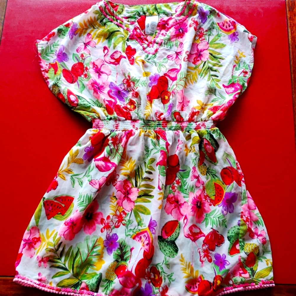 This is a swimsuit cover up size 10 in girls.
